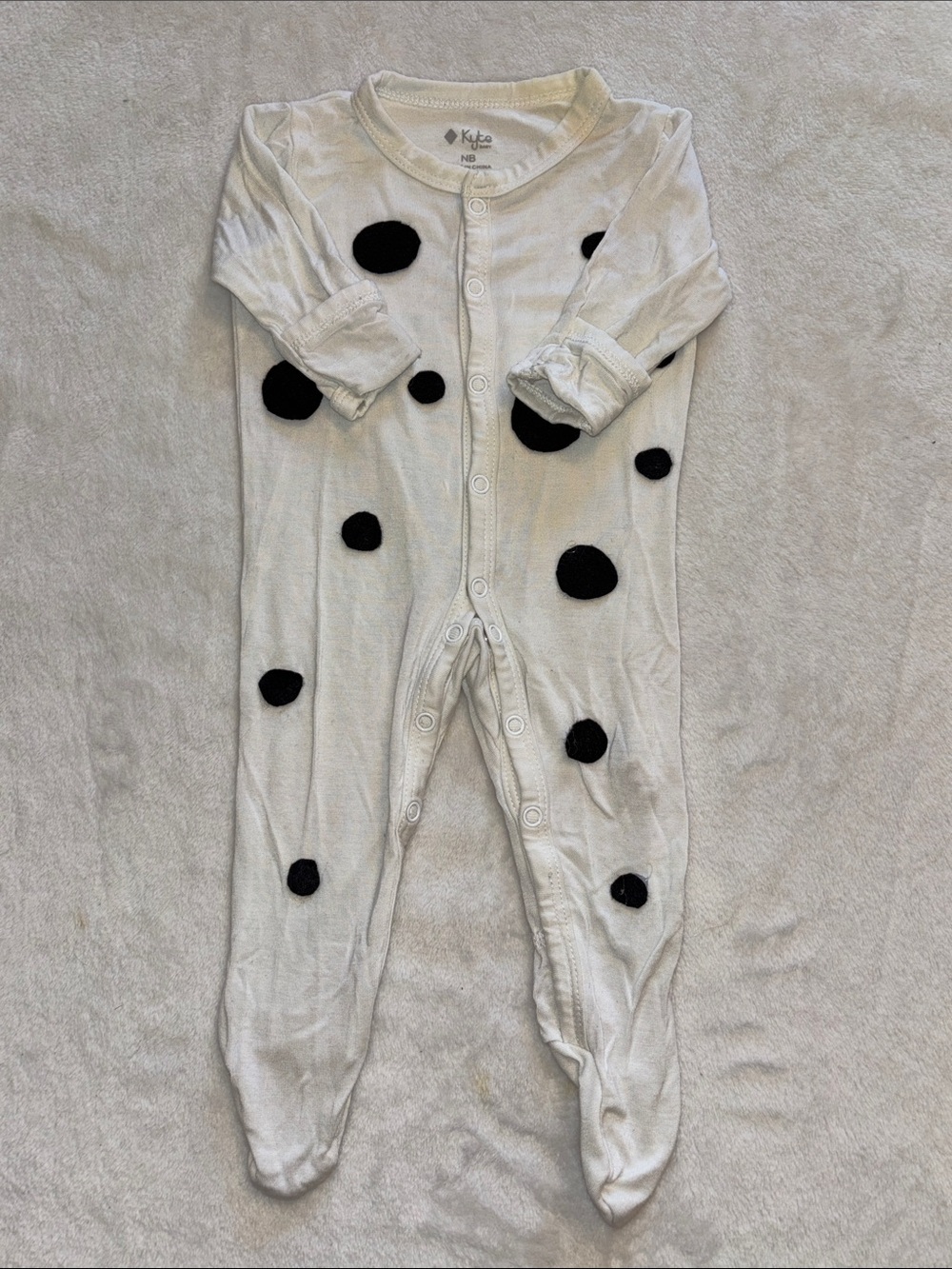 KYTE baby White and Black Polka Dot Baby One-Piece footie snap up